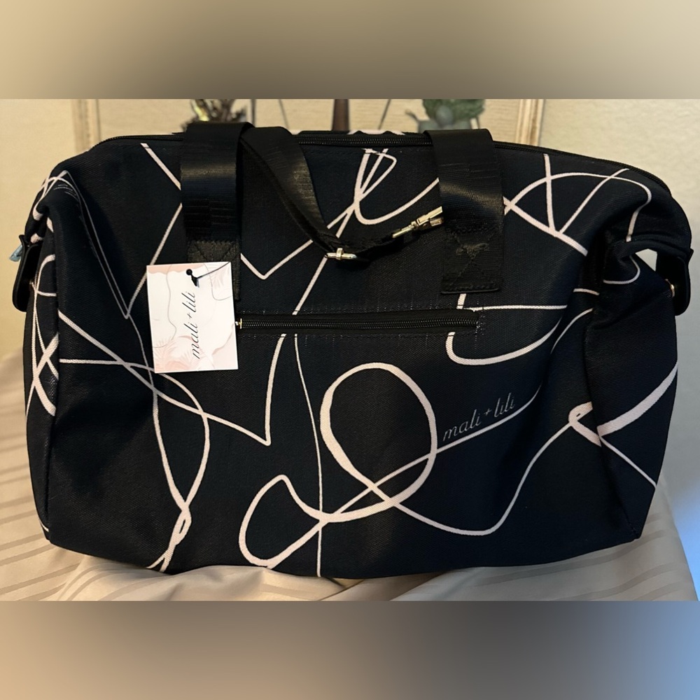 NWT Mali + Lili weekend bag in black and white design on canvas. Plenty of room